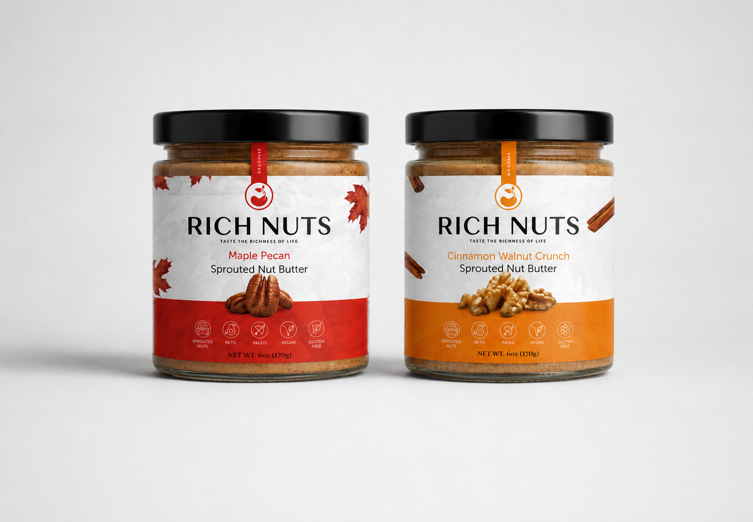 Rich Nuts Maple Pecan and Cinnamon Walnut Crunch Sprouted Nut Butter duo on a wood countertop with dark chocolate and spoon